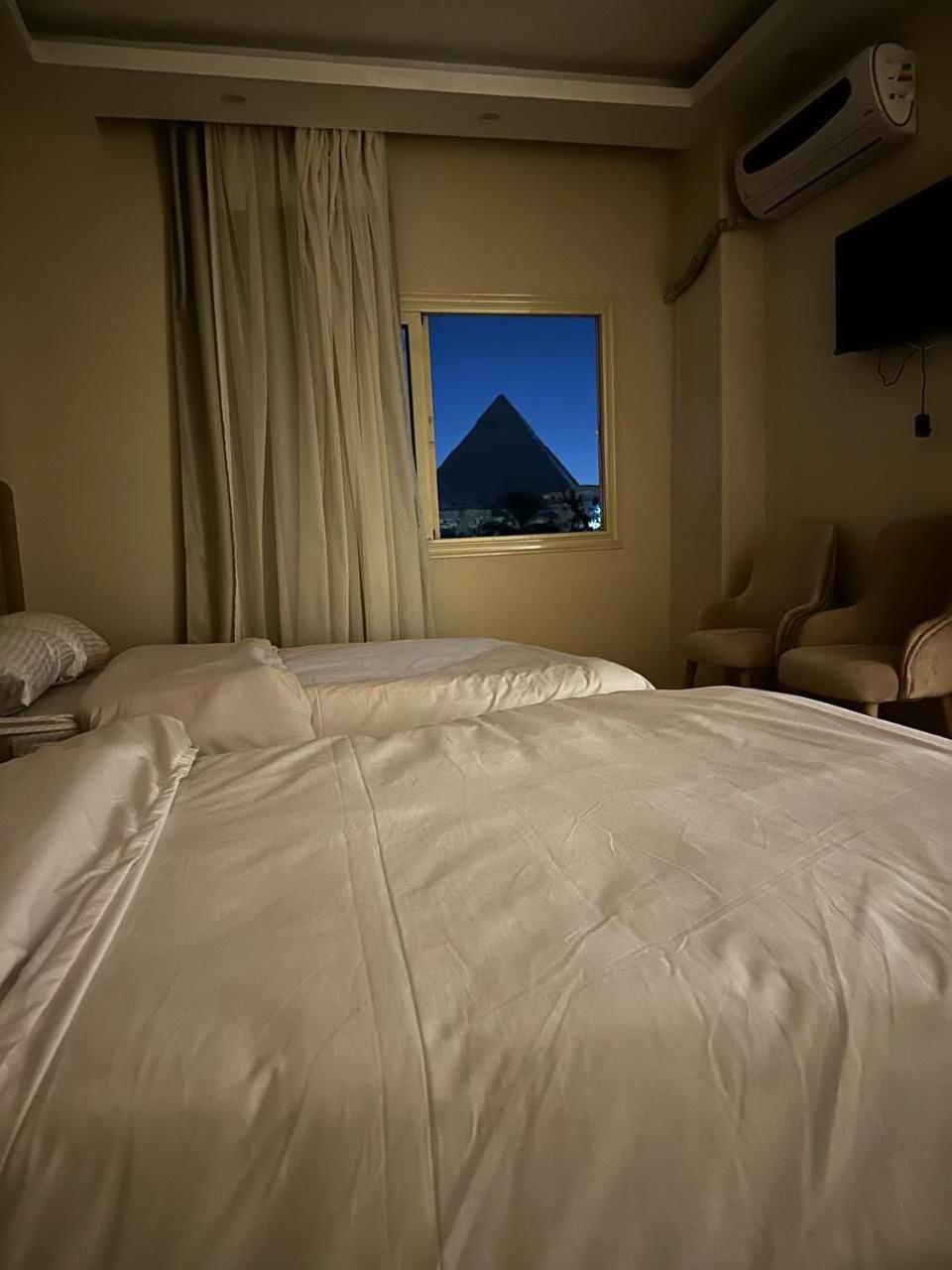 Pyramids Era View Hotel Kafrat al Jabal Bagian luar foto